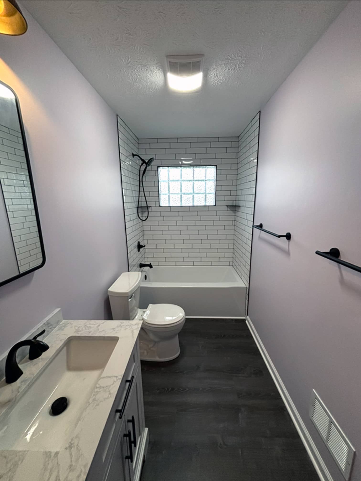 Accessible bathroom with walk-in shower and modern finishes in a Gahanna-area home